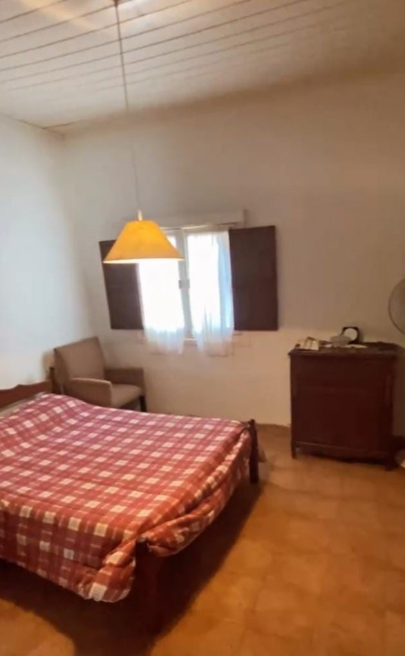 CASA FAMILIAR, CON LOTE, EXCELENTE UBICACION Y ESTADO